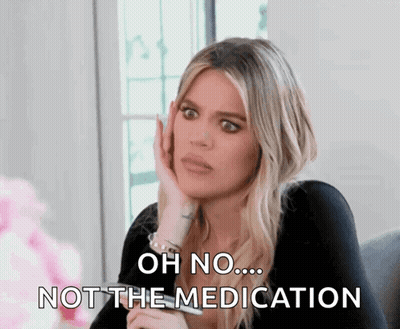 A Woman Is Holding Her Hand To Her Face And Saying Oh No Not The Medication GIF