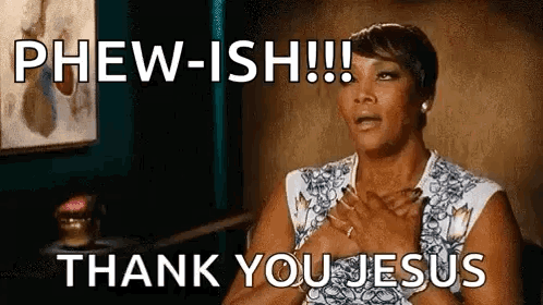 A Woman Is Holding Her Hands Over Her Chest And Saying Thank You Jesus . GIF