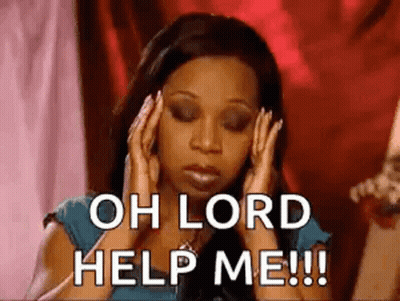 A Woman Is Holding Her Head In Her Hands And Saying `` Oh Lord Help Me '' . GIF
