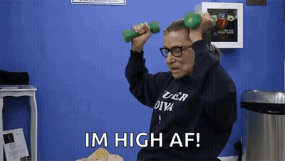 A Woman Is Holding Two Green Dumbbells In Her Hands And Saying Im High Af . GIF