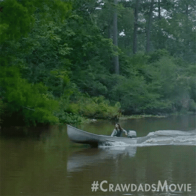 A Woman Is In A Boat On A River With The #Crawdadsmovie Written On The Bottom GIF