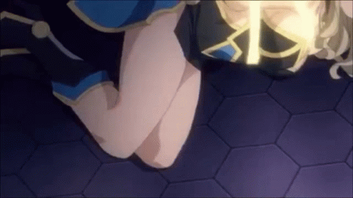 A Woman Is Kneeling Down With Her Legs Crossed And A Light Shining On Her Thighs . GIF