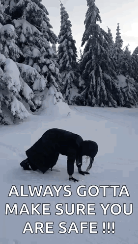 A Woman Is Kneeling In The Snow With The Words " Always Gotta Make Sure You Are Safe !!! " GIF
