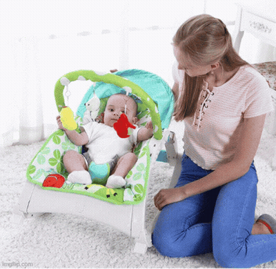 A Woman Is Kneeling Next To A Baby In A Bouncer That Says Imgflip.com On The Bottom GIF