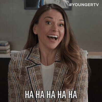 A Woman Is Laughing And Says Ha Ha Ha Ha GIF