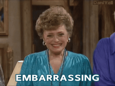 A Woman Is Laughing And The Word Embarrassing Is On The Bottom GIF