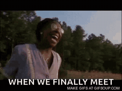 A Woman Is Laughing In A Field With The Words When We Finally Meet . GIF