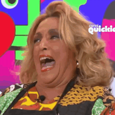 A Woman Is Laughing In Front Of A Colorful Background With The Words Canal Quickie On It GIF