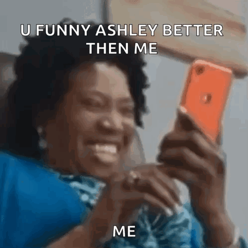 A Woman Is Laughing While Looking At Her Phone And Says U Funny Ashley Better Then Me Me . GIF