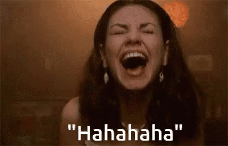 A Woman Is Laughing With Her Mouth Open And The Words `` Hahaha '' Written Below Her . GIF