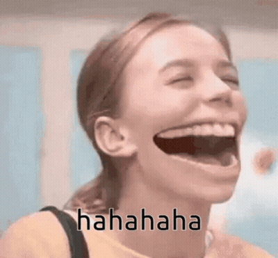A Woman Is Laughing With Her Mouth Wide Open And The Words `` Hahahaha '' Written On Her Face . GIF