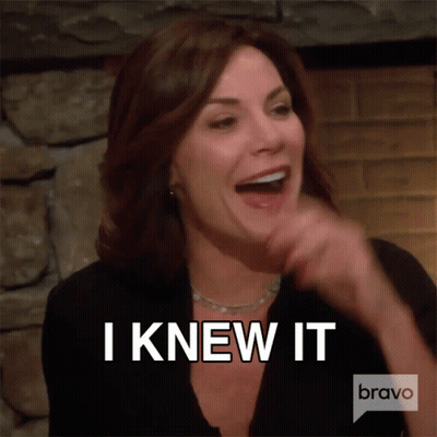 A Woman Is Laughing With The Words I Knew It Above Her GIF