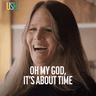 A Woman Is Laughing With The Words Oh My God It 'S About Time GIF