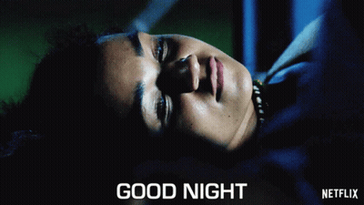 A Woman Is Laying Down With The Words " Good Night " Written Above Her GIF