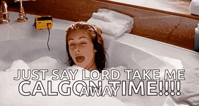 A Woman Is Laying In A Bathtub With The Words Just Say Lord Take Me Calgowaytime GIF