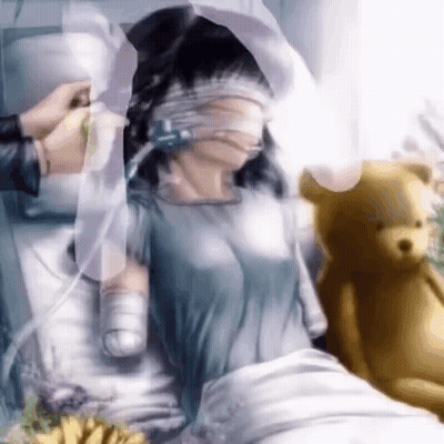A Woman Is Laying In A Hospital Bed With A Teddy Bear Next To Her GIF