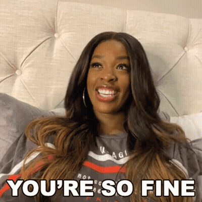 A Woman Is Laying On A Bed And Smiling With The Words " You 'Re So Fine " Written Below Her GIF