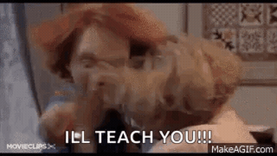A Woman Is Laying On A Bed With A Dog And Says `` I 'Ll Teach You '' . GIF