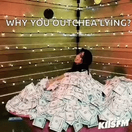 A Woman Is Laying On Top Of A Pile Of Money With The Caption Why You Outchea Lying GIF