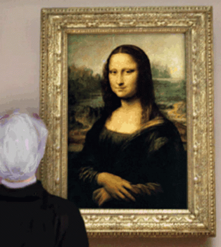 A Woman Is Looking At A Painting Of A Woman In A Gold Frame GIF