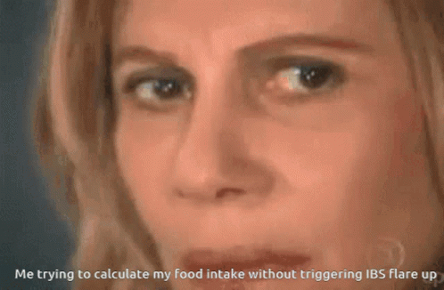 A Woman Is Looking At A Triangle With The Equation A = 1B.h. GIF