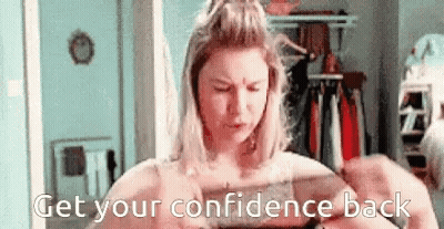 A Woman Is Looking At Herself In A Mirror With The Words " Get Your Confidence Back " Written Below Her . GIF