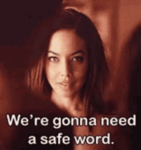 A Woman Is Looking At The Camera With The Words `` We 'Re Gonna Need A Safe Word . '' GIF