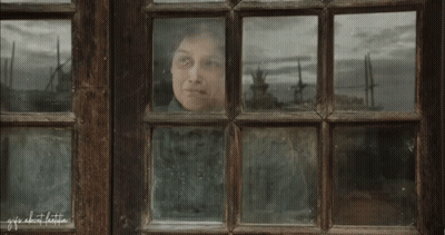 A Woman Is Looking Out Of A Window With The Words " Life About Little " Written On The Bottom GIF