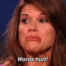 A Woman Is Making A Face And Saying Words Hurt ! GIF