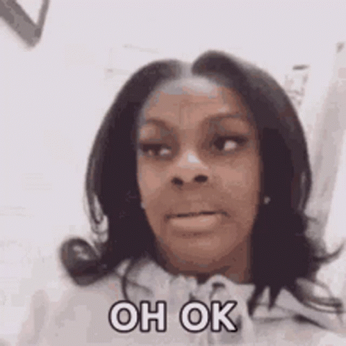 A Woman Is Making A Face And Says `` Oh Ok '' . GIF