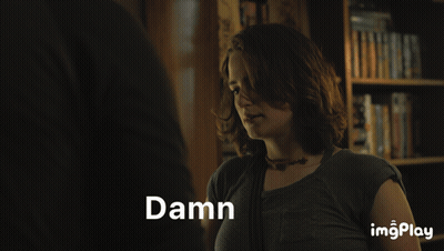 A Woman Is Making A Face And The Word Damn Is Displayed Above Her GIF
