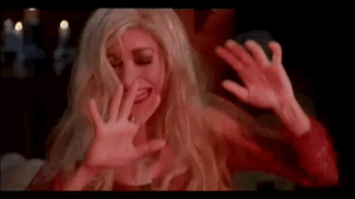 A Woman Is Making A Face With Her Hands And The Word Yikes Is On The Bottom GIF