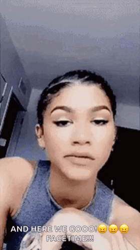 A Woman Is Making A Funny Face And Saying And Here We Goooo Facetime ! GIF