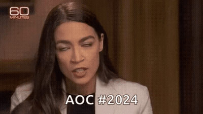 A Woman Is Making A Funny Face And Saying Aoc # 2024 While Sitting In A Chair . GIF