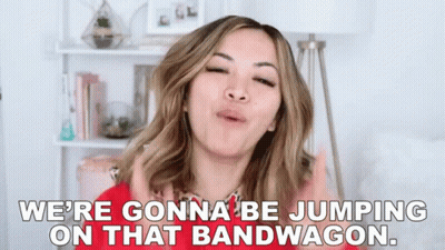A Woman Is Making A Funny Face And Saying `` We 'Re Gonna Be Jumping On That Bandwagon . '' GIF