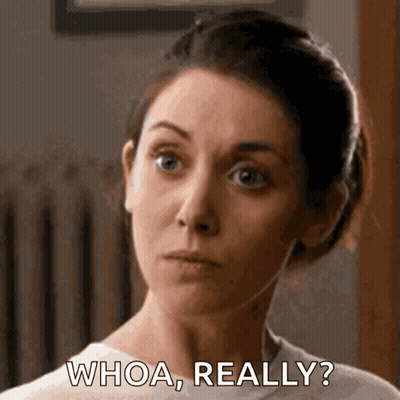 A Woman Is Making A Funny Face And Saying Whoa Really . GIF