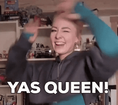 A Woman Is Making A Funny Face And Saying Yas Queen ! GIF