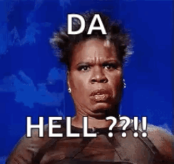 A Woman Is Making A Funny Face And Says `` Da Hell ? '' . GIF