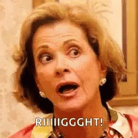 A Woman Is Making A Funny Face With Her Mouth Open And A Shocked Look On Her Face . GIF