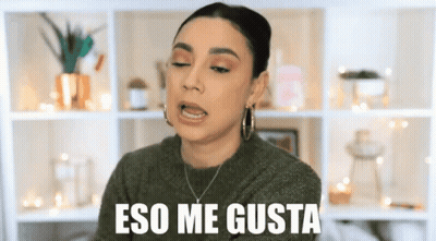 A Woman Is Making A Funny Face With The Words Eso Me Gusta Behind Her GIF