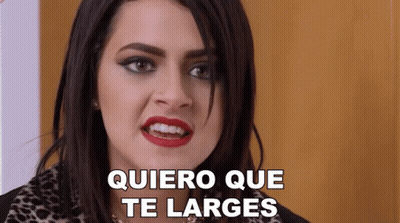 A Woman Is Making A Funny Face With The Words Quiero Que Te Larges Above Her GIF