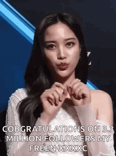 A Woman Is Making A Heart Shape With Her Hands And Says Congratulations On 3.3 Million Followers My Freen Xxxc . GIF
