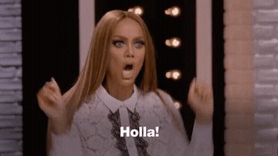 A Woman Is Making A Surprised Face And Saying Holla ! GIF