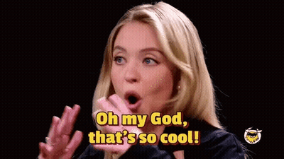 A Woman Is Making A Surprised Face And Saying Oh My God That 'S So Cool . GIF