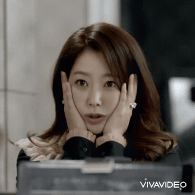 A Woman Is Making A Surprised Face With Her Hands On Her Face And The Words Vivavideo Behind Her GIF