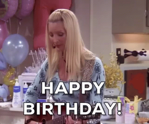 A Woman Is Playing A Guitar And Saying Happy Birthday GIF