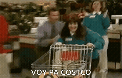 A Woman Is Pushing A Shopping Cart In A Grocery Store And Says `` Voy Pa Costco '' . GIF