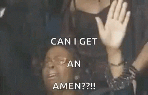 A Woman Is Raising Her Hands In The Air And Says `` Can I Get An Amen '' . GIF