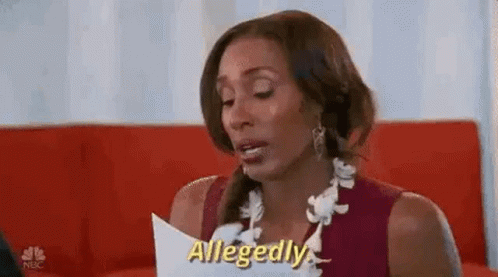 A Woman Is Reading A Piece Of Paper And Saying Allegedly . GIF