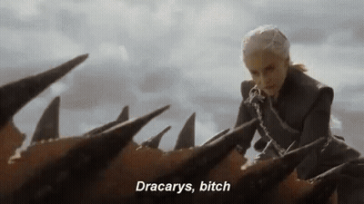 A Woman Is Riding On The Back Of A Dragon . GIF